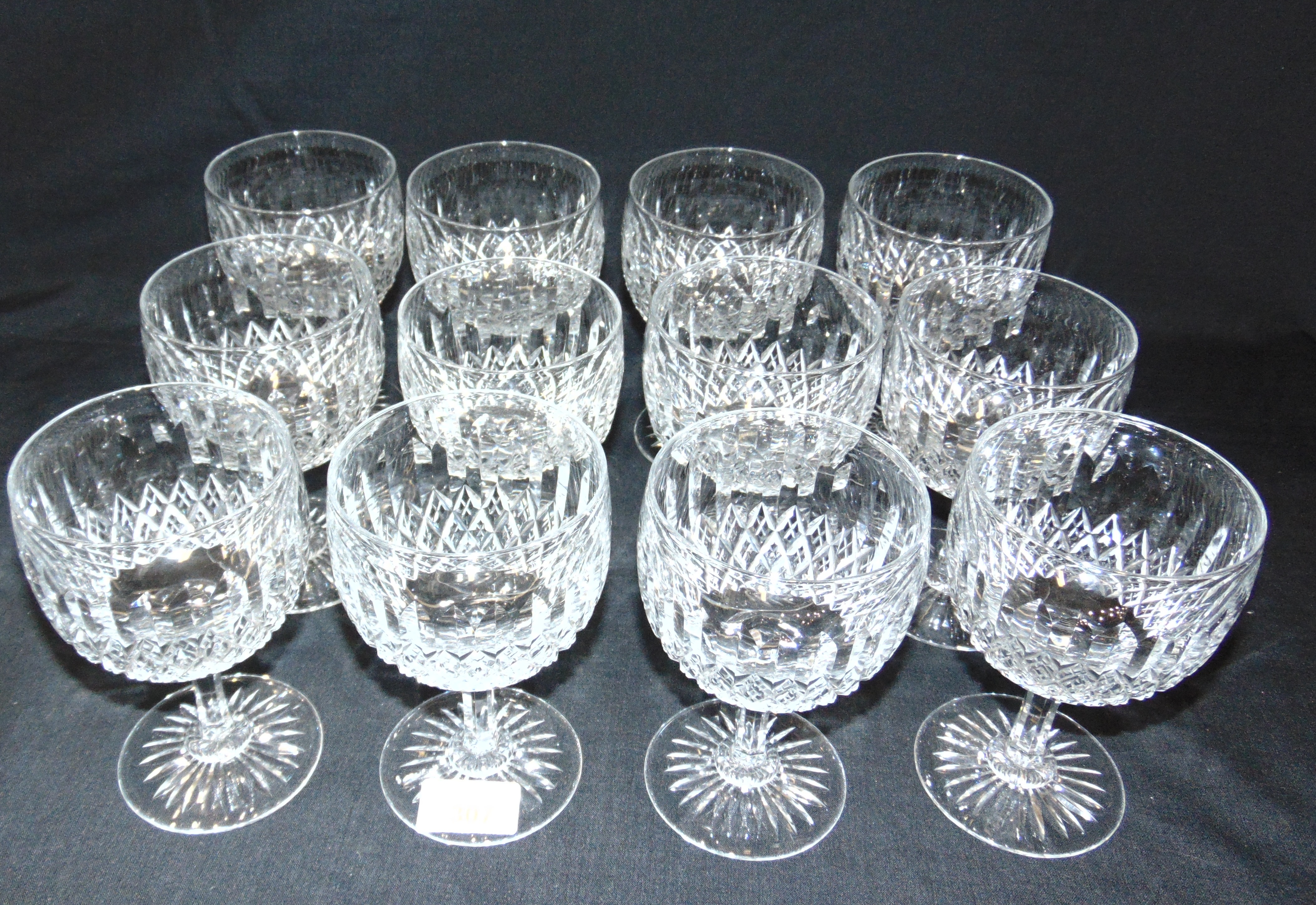 A SET OF 12 THOMAS WEBB 'NORMANDY' PATTERN WATER GOBLETS 15cm high