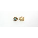 A MODERN CONTINENTAL TURQUOISE SINGLE STONE KNOT RING AND A BAND RING the knot ring in the form of