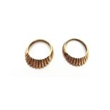 A PAIR OF 1960'S 9CT GOLD RINGS designed to fit together to form a tapering and reeded-arch above