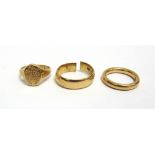 TWO VICTORIAN AND LATER 22CT GOLD RINGS AND ANOTHER comprising; a late Victorian 22ct gold small