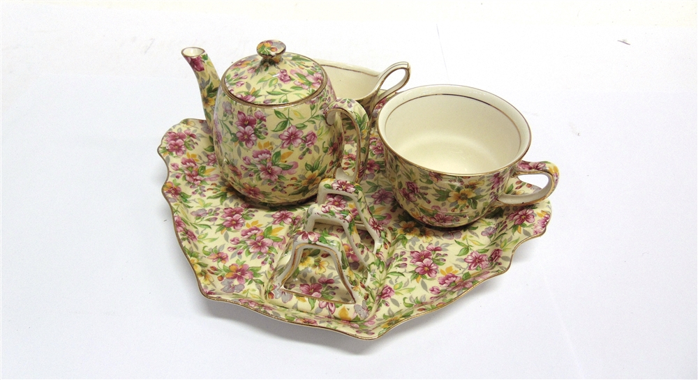 ***WITHDRAWN*** A ROYAL WINTON 'GRIMWADES' BREAKFAST SET comprising, teapot, cup, sugar basin,
