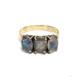 AN EARLY 19TH CENTURY GOLD AND OPAL-TRIPLET THREE STONE RING the three oval stones each claw set