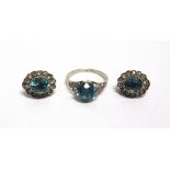 AN EARLY 20TH CENTURY WHITE GOLD, BLUE-ZIRCON AND DIAMOND RING the round zircon-cut zircon approx.