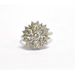 A MODERN DIAMOND CLUSTER RING the 25 graduated round brilliants approx. 2.10cts total ( the