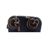 A PAIR OF MODERN 18CT GOLD AND AMETHYST STUD EARRINGS each rub-over set with a small round