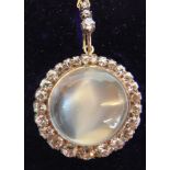 A LATE VICTORIAN MOONSTONE AND DIAMOND BROOCH/PENDANT centred with a cabochon moonstone approx. 20mm