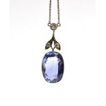 AN EARLY 20TH CENTURY SAPPHIRE AND DIAMOND PENDANT NECKLACE the front designed as an oval-ish