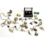 A COLLECTION OF SEVENTEEN PAIRS OF SILVER AND WHITE METAL EARRINGS, SOME GEM SET; in many varied