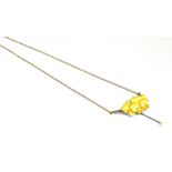 A MODERN SILVER, YELLOW ENAMEL, CULTURED PEARL AND DIAMOND FLORAL NECKLACE the front designed as a