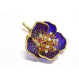 A FRENCH GOLD, PLIQUE-A-JOUR ENAMEL, RUBY AND DIAMOND FLOWER BROOCH EN TREMBLANT the flower with a
