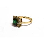 A 9CT GOLD, GREEN PASTE AND DIAMOND SQUARE CLUSTER RING the central square paste