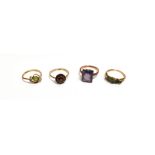 AN GROUP OF FOUR GOLD AND GEM SET RINGS comprising; an early Victorian gold and emerald graduated