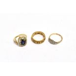 THREE MODERN 9CT GOLD AND GEM SET RINGS comprising; an oval mixed-cut dark-blue synthetic-sapphire