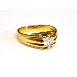 AN 18CT GOLD AND DIAMOND SINGLE STONE GYPSY RING the round brilliant approx. 5.8mm diameter with a