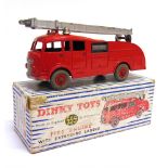 A DINKY NO.555, COMMER FIRE ENGINE WITH EXTENDING LADDER red with matching grooved hubs, silver