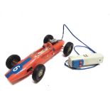 A GAMA PLASTIC BATTERY-OPERATED LOTUS FORD RACING CAR orange and blue, racing number 6, unboxed (not