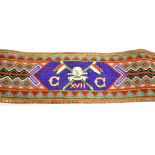 MILITARIA - AN INDIAN LEATHER & WOOLLEN TAPESTRY 17TH LANCERS BELT 72.5cm long.