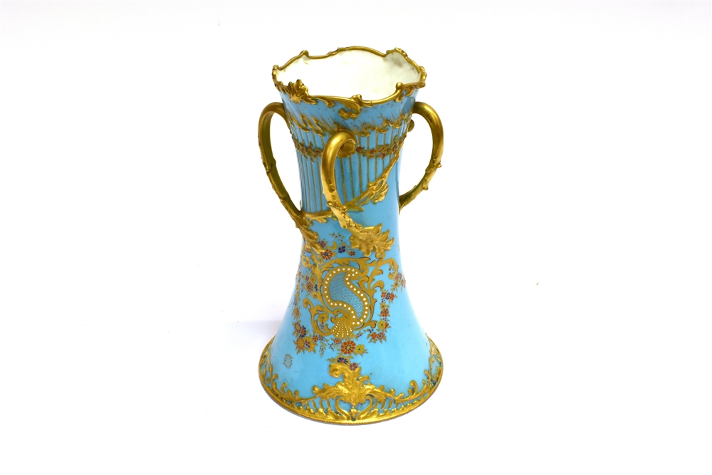 A LARGE ROYAL CROWN DERBY THREE HANDLED VASE of waisted form, floral and gilt decoration on a