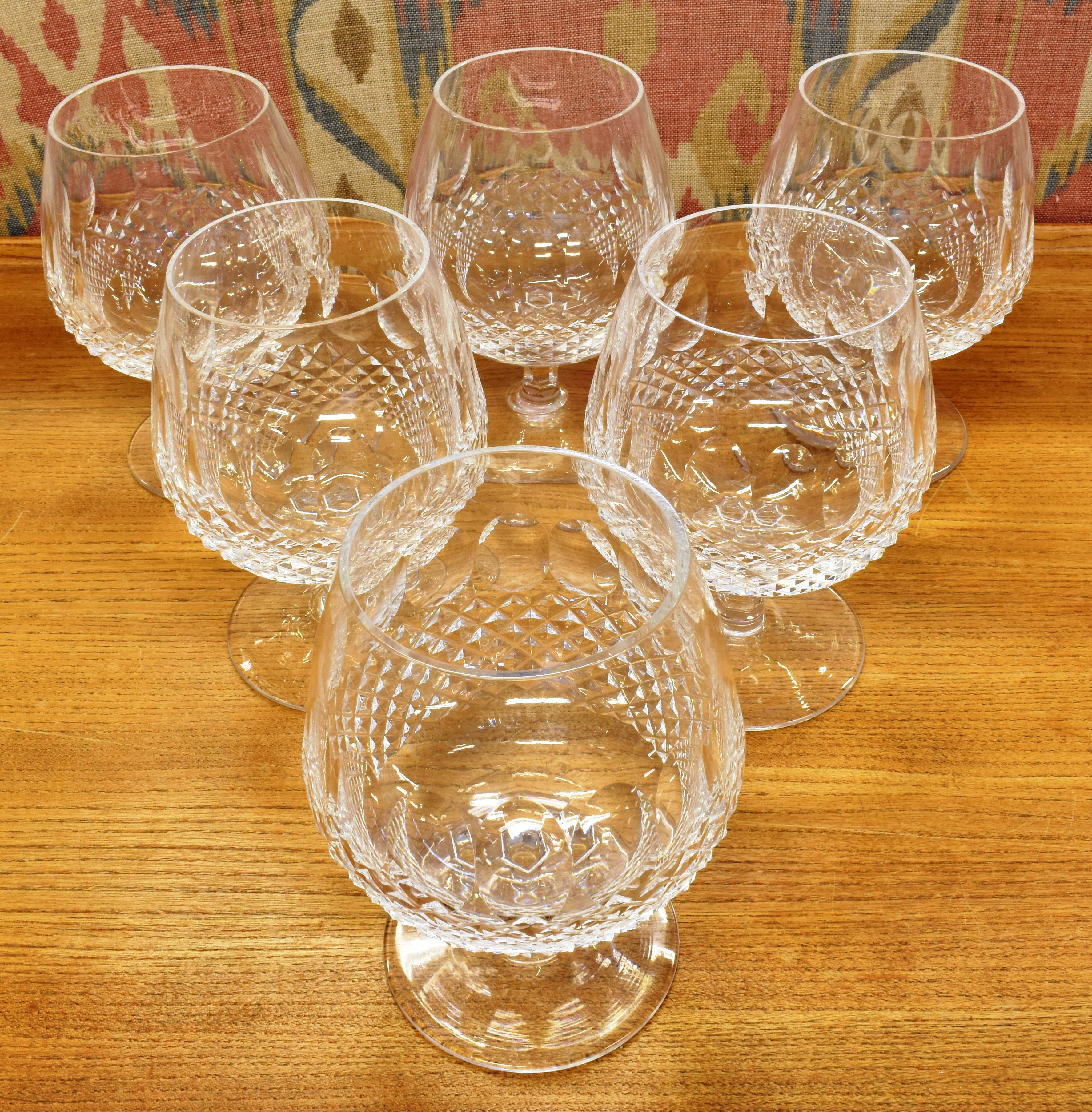 WATERFORD CRYSTAL: A SET OF SIX 'COLLEEN' PATTERN BRANDY BALLOONS 13.5cm high