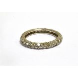 AN EARLY-MID 20TH CENTURY PLATINUM AND DIAMOND ETERNITY RING the 62 eight-cut stones approx. 1.80cts