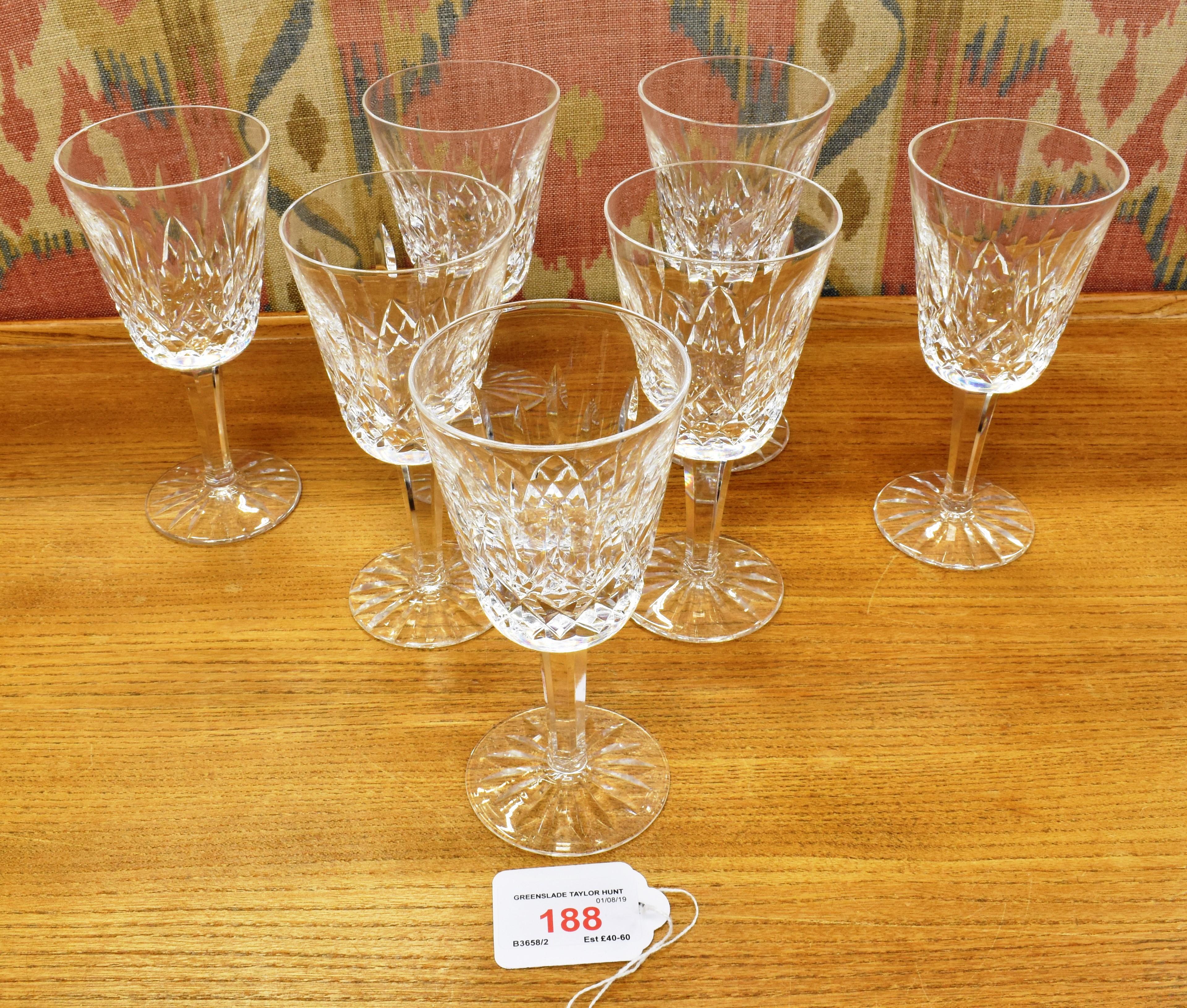 WATERFORD CRYSTAL: A SET OF SIX 'LISMORE' PATTERN WINE GLASSES 14cm high