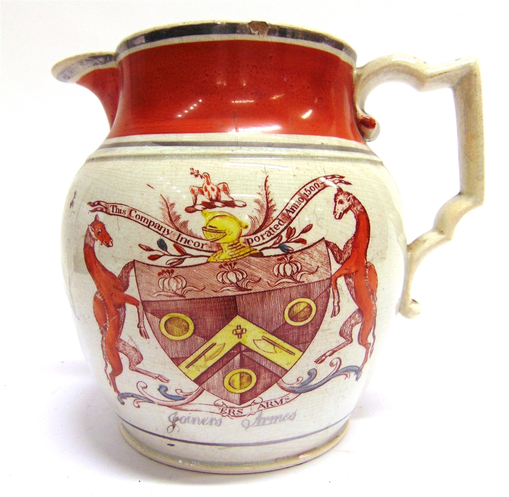 A 19TH CENTURY TRANSFER-PRINTED ARMORIAL JUG one side bearing the Joiners Arms and the other a