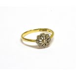 AN EARLY 20TH CENTURY GOLD AND DIAMOND CLUSTER RING the nine small eight-cut stones grain set in