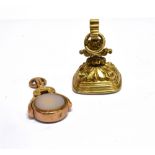TWO 19TH CENTURY FOBS comprising; a 19th century gold-plated oblong fob seal with a scroll and