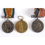 A GREAT WAR PAIR OF MEDALS TO PRIVATE M. PERRY, ROYAL WARWICKSHIRE REGIMENT comprising the British