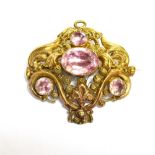 AN EARLY VICTORIAN REPOUSSE GOLD AND PINK FOIL-BACKED QUARTZ FOUR STONE CANNETILLE BROOCH the back