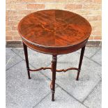 AN EDWARDIAN CIRCULAR MAHOGANY OCCASIONAL TABLE with inlaid decoration, on tapering reeded supports,