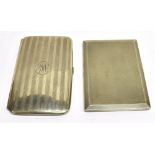 TWO EARLY 20TH CENTURY SILVER ENGINE TURNED RECTANGULAR CIGARETTE CASES one with rounded corners,