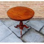 A TILT TOP TRIPOD OCCASIONAL TABLE the circular top 68cm diameter, 73cm high