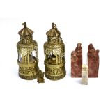 A PAIR OF CHINESE BRASS OIL LAMPS 17cm high, together with a pair of carved hardstone seals and