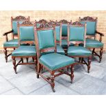 A SET OF EIGHT VICTORIAN CARVED MAHOGANY DINING CHAIRS including a pair of carvers