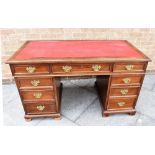 AN EDWARDIAN MAHOGANY TWIN PEDESTAL DESK 158cm wide 67cm deep 76cm high