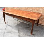 A PROVINCIAL FRENCH FRUITWOOD DINING TABLE with four plank top, on square tapering supports, 91cm