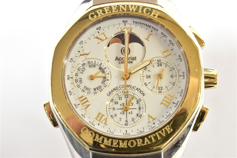 ACCURIST, GRAND COMPLICATIONS, A GENTLEMAN'S STAINLESS STEEL AND GILT QUARTZ BRACELET WATCH FROM ' - Image 7 of 7