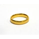 A 22CT GOLD WEDDING BAND the court-shaped band approx. 4.5mm wide, Birmingham 1927, size P+, 6.8g