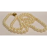 A CULTURED-PEARL SINGLE ROW NECKLACE the 91 round white-rose beads approx. 7.4mm-7.9mm diameter,