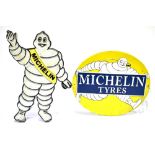 A MICHELIN 'MR BIBENDUM' ADVERTISING SIGN of painted cast iron construction, modern, 33cm high; An