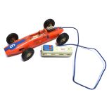 A GAMA PLASTIC BATTERY-OPERATED LOTUS FORD RACING CAR orange and blue, racing number 6, unboxed (not