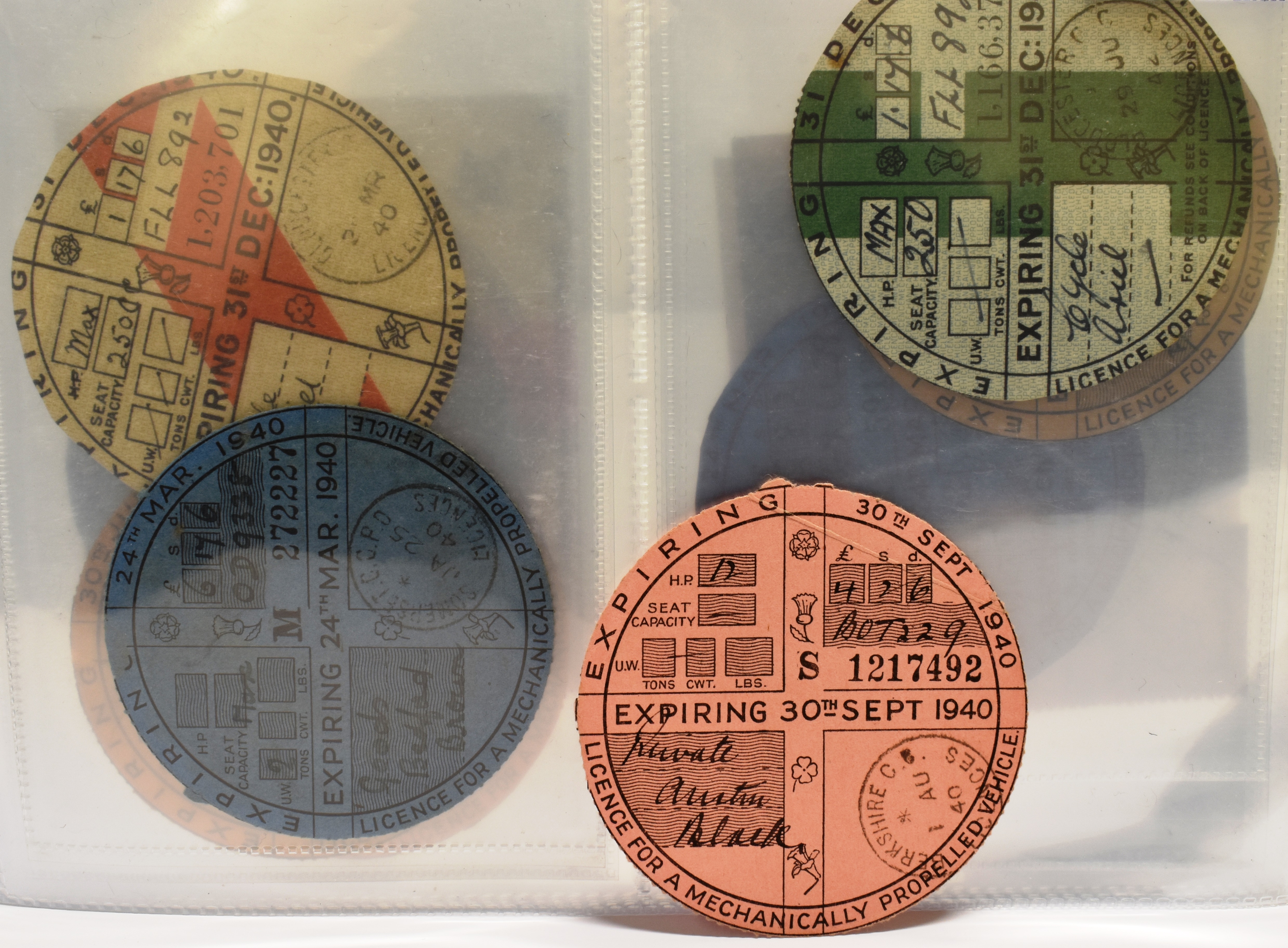 A COLLECTION OF FOURTEEN 1940'S VEHICLE ROAD TAX DISCS (1940 TO 1949) 3 x 1940, 4 x 1942, 1 x