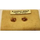 TWO PAIRS OF 9CT GOLD EARRINGS INCLUDING A PAIR OF RUBY AND DIAMOND CLUSTER STUD EARRINGS each