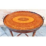 AN EDWARDIAN MAHOGANY TRAY TOP OCCASIONAL TABLE the oval top with shaped gallery and marquetry