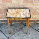 A MARBLE TOP OCCASIONAL TABLE with brass gallery and painted decoration, 46cm wide