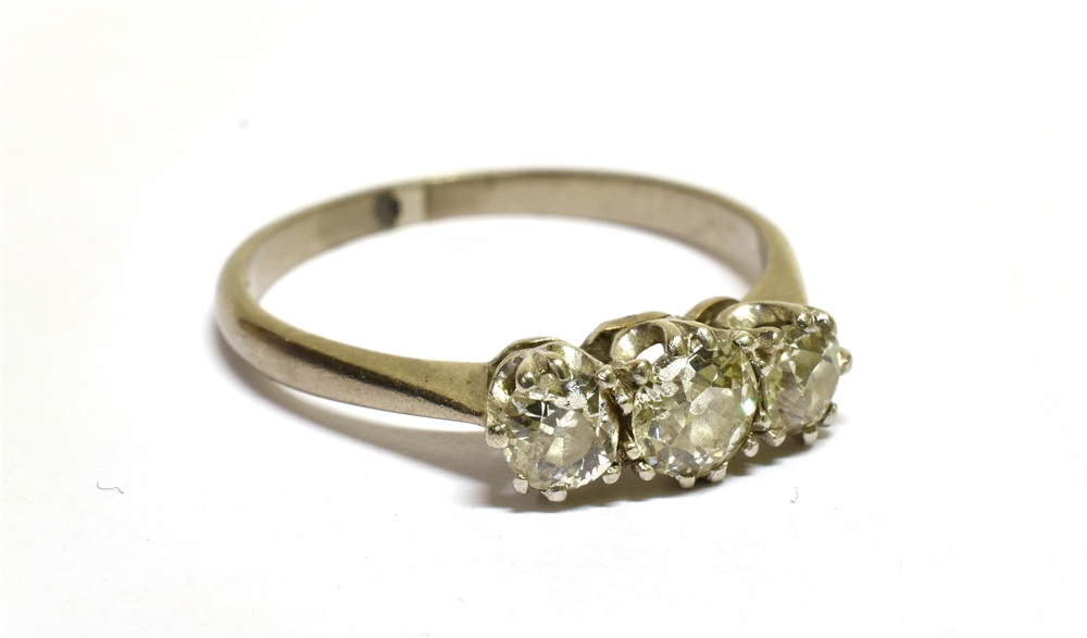 A MID-20TH CENTURY OLD-CUT DIAMOND THREE STONE RING the graduated old-cut stones approx. 0.72cts - Image 2 of 3