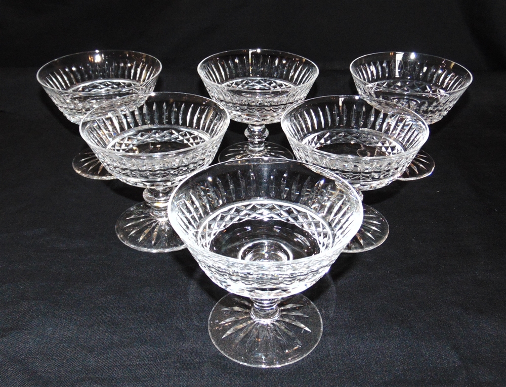 WATERFORD CRYSTAL: a set of six 'Tramore' pattern champagne saucers, 9cm high