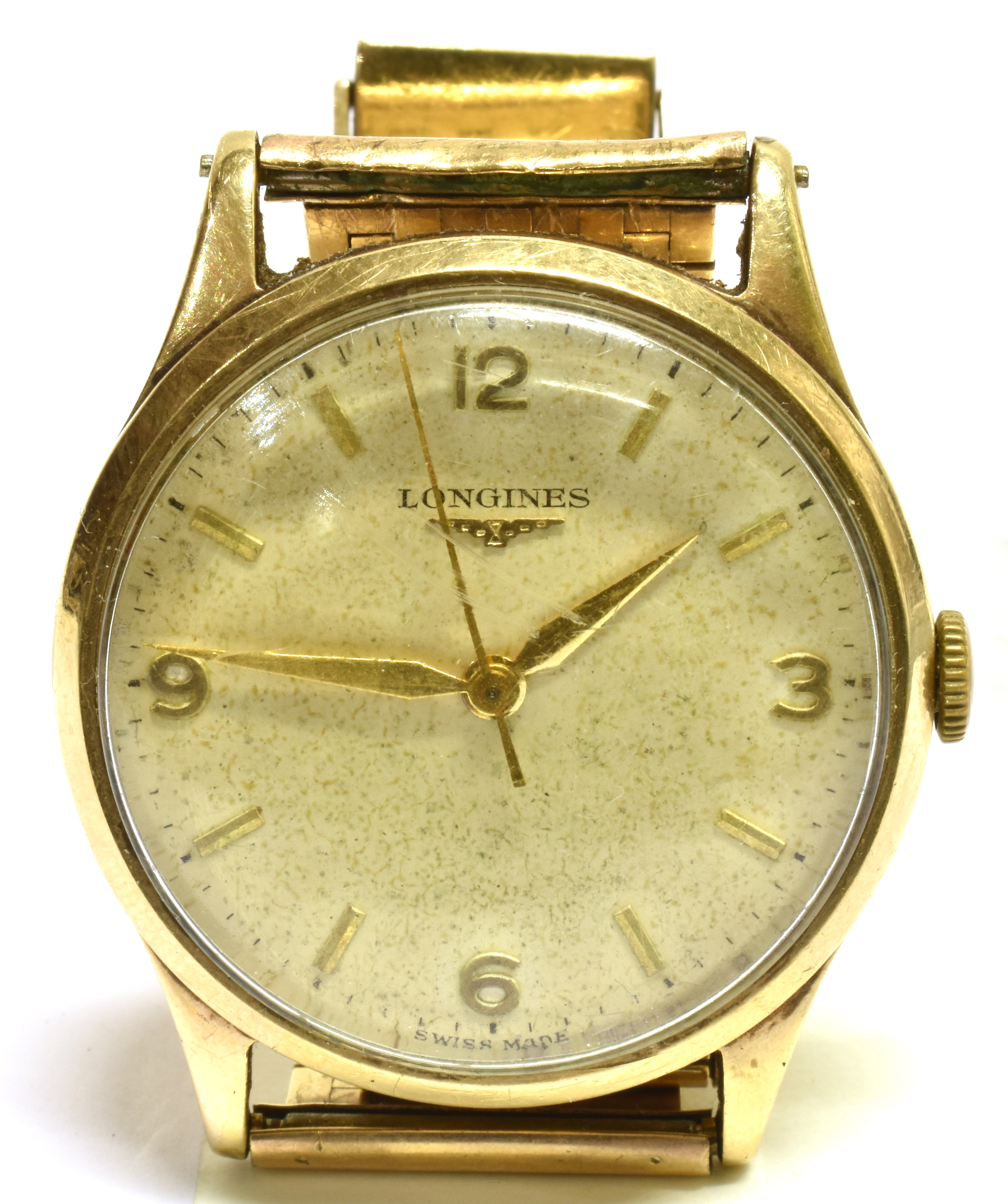 LONGINES, A GENTLEMAN'S 9CT GOLD ROUND BRACELET WATCH, CIRCA 1956 cream dial with baton numerals and