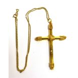 A 19TH CENTURY CONTINENTAL GOLD CROSS of tubular-Latin cross design with filigree terminals,